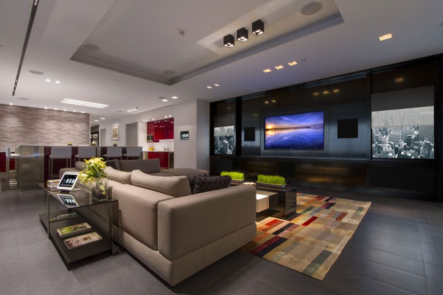 Modern Deer Valley living room with ultra-high-definition screen, Sony projection, Sonos speakers, and Bowers & Wilkins surround sound for immersive home theater installation