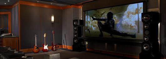 Salt Lake City luxury residence featuring automated multi-room audio-video entertainment with premium surround sound speakers, guitars on display, and smart lighting integration